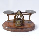 A 19th century Sampson Mordan & Co of London set of postal scales and weights, engraved foliate