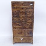 A Vintage pine engineer's table-top chest of drawers, height 60cm
