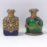 A 19th century green glass scent bottle, with gilt-metal swag decoration and inset panel to the lid,