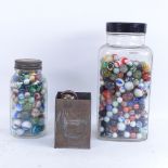 A large quantity of various marbles (3 jars)