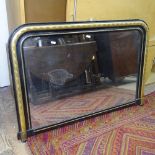 A 19th century ebonised and gilded over mantel mirror, W102cm, H70cm