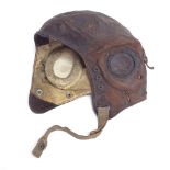 A Second War Period pilot's leather flying cap, with original buckles and fittings