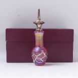 A pink lustre scent flask with applied silver tracery and stopper, height 16cm