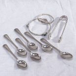 A set of 6 silver coffee spoons with shell motifs and matching tongs, and a silver baby's