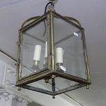 A brass-framed and 4-glass panel hanging light fitting, L44cm