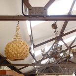 A Vintage painted wrought-iron floral 3-branch chandelier, and a woven palm leaf light shade,