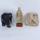 An Antique carved stone plaque, large carved ebony elephant, and resin sculpture (3)