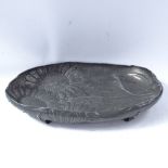 An Italian Art Nouveau large pewter dish, by B Bellotti, relief embossed sunflower decoration with