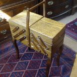 An oak cantilever sewing cabinet, W50cm, height to top of handle 80cm