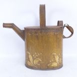 A large Vintage painted and gilded tin gardening watering can, floral decoration with hinged lid,