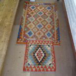 A Choli Kilim rug, 120cm x 79cm, and a Kilim mat, 52cm x 50cm (2)
