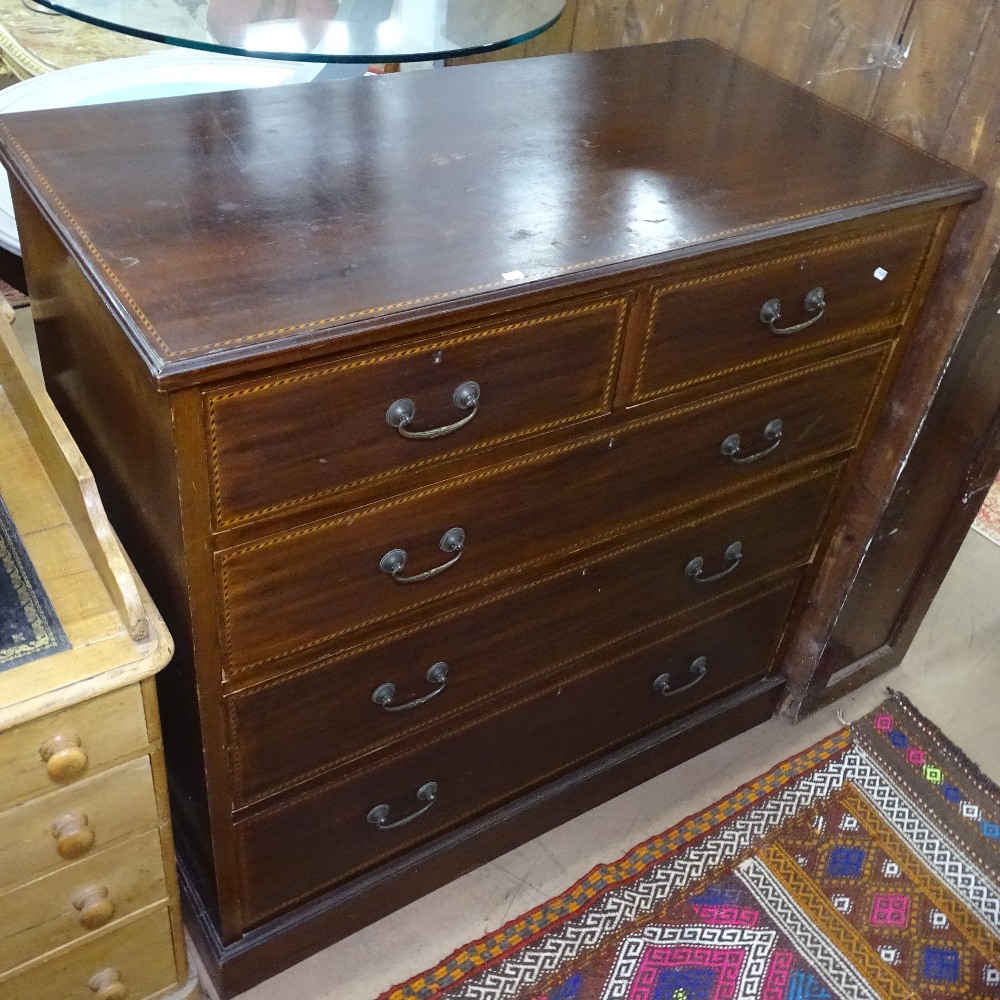 A late Victorian and mahogany chequered-banded square chest of 2 short and 3 long drawers, on plinth