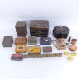 A collection of various painted tin cigarette advertising boxes and containers