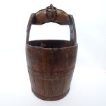 A large oak coopered bucket/waste paper bin, overall height 54cm