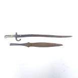 A French First War Period sword bayonet, and a Tribal spear head, bayonet blade length 57cm (2)