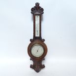 An oak-cased wheel barometer and thermometer, by Newton & Co of London, overall height 68cm