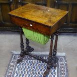 A Victorian walnut sewing table, with single frieze drawer and basket under, raised on quadruple