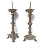 A large pair of cast-brass pricket candlesticks, pierced floral stems, height 40cm