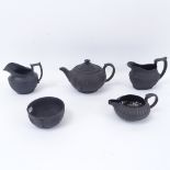 Wedgwood Black Basalt Ware teapot, jugs and a sugar bowl