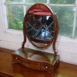 A 19th century mahogany box swing toilet mirror, with 3 serpentine-front drawers and ivory mounts,