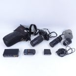 A Vintage Nikon FESLR camera with accessories, including Zoom 70~210mm 1:4, etc