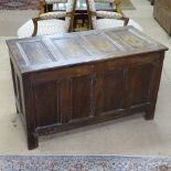 An 18th century panelled oak coffer, width 3'5"