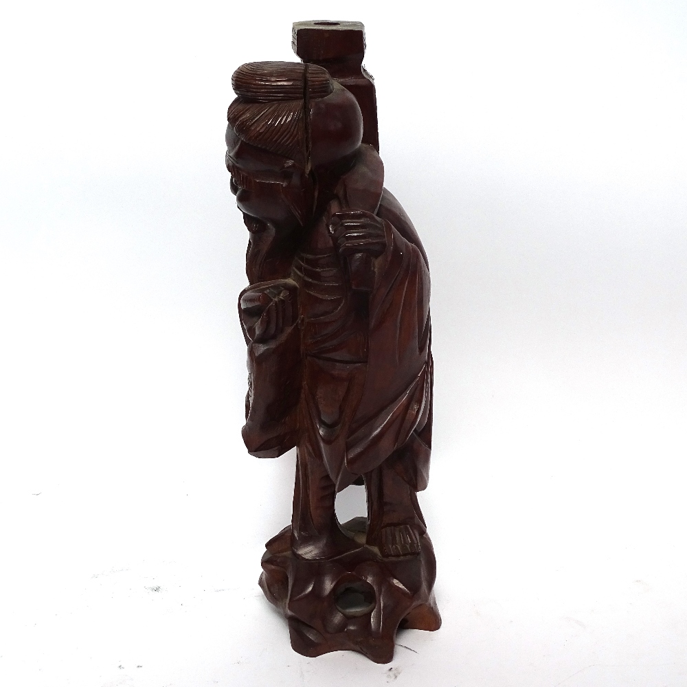 A painted and gilded wood Dog of Fo carving, and a Chinese carved hardwood figure of a Sage, Sage - Image 3 of 3