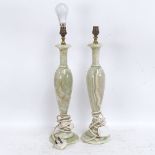 A pair of carved and polished green onyx pedestal table lamps, height excluding fitting 45cm