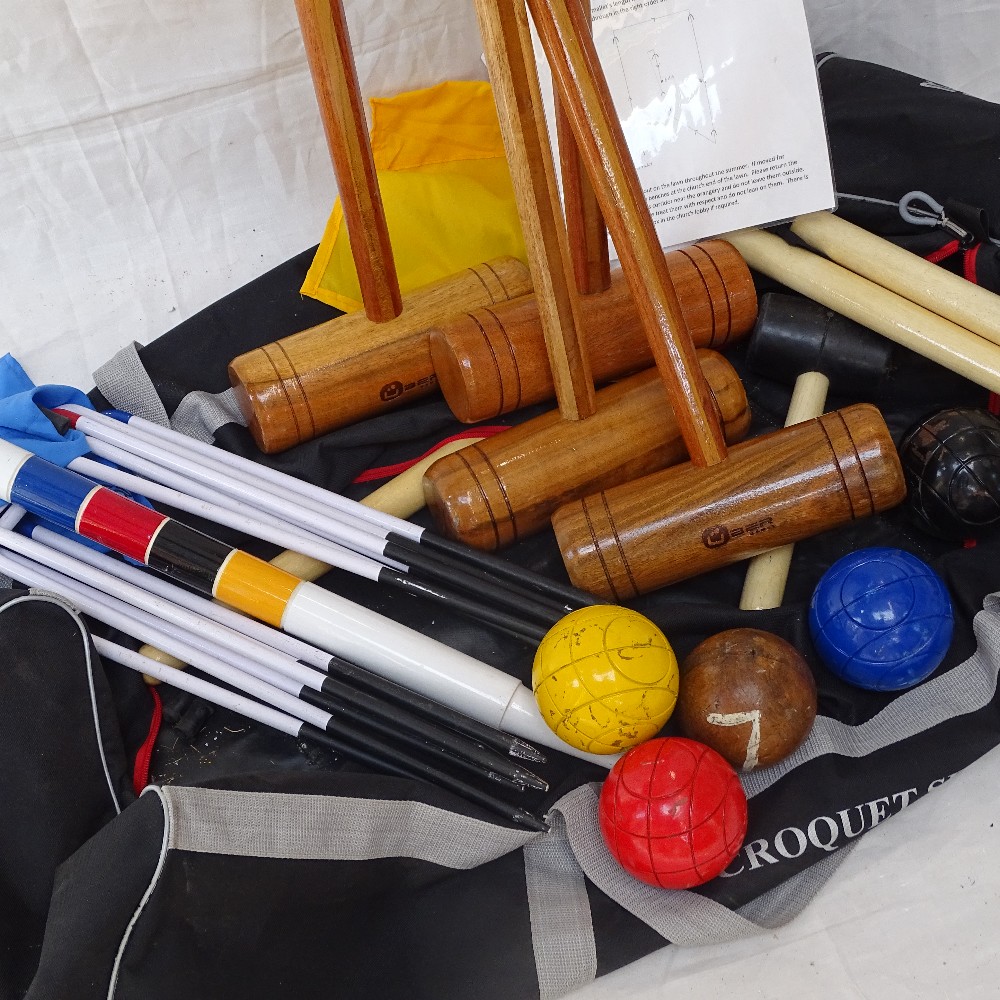 A modern croquet set in carrier bag