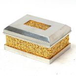 A Royal Selangor pewter and gold plated box and cover, relief floral banded decoration, length 8.5cm