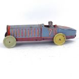 A Vintage tinplate toy racing car, length 31cm