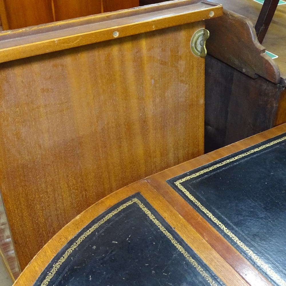 A reproduction mahogany bow-end pull-out dining/boardroom table, having tooled black leather - Image 3 of 3