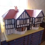 A large Tudor style dolls house