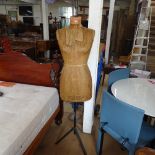 A Vintage mannequin on iron tripod stand, mannequin marked Yugin & Sons Ltd, museum 69SS/6370,