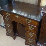 An Antique Queen Anne style knee-hole mahogany writing desk, with 1 long and 3 short drawers,