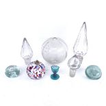 A large cut-glass crystal stopper, 2 smaller stoppers, pair of hand-blown glass candle holders