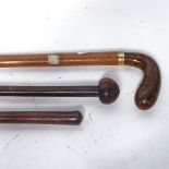 A Malacca walking stick with 14ct gold collar and Bakelite handle, and 2 other hardwood canes (3)