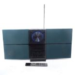 A Bang & Olufsen Beosound Century Danish music system, type no. 2651, with remote, length 75cm