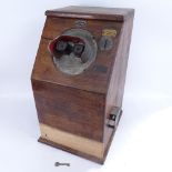 A mid-century Krafts Automatics Ltd coin-in-the-slot stereoscopic viewer arcade machine, oak-