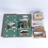 A collection of various topographical postcards, and a Vintage album