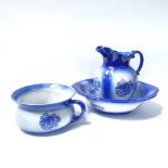 A wash jug and basin and matching chamber pot, with printed riverside house design