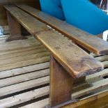 A pair of early 19th century fruitwood refectory benches, L202cm, D16cm, H50cm