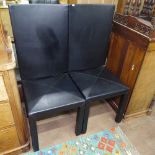 A pair of Arcadia B&B Italia black leather high-back dining chairs, by Paolo Piva, with impressed