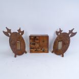 A pair of carved wood Medieval style photograph frames, and a marquetry inlaid table top collector's
