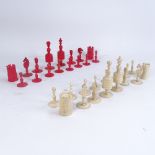 A 19th century natural and red stained bone chess set, King height 10cm, together with inlaid wood