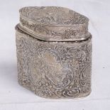A Continental silver tea caddy of shaped oval form with relief embossed lovers scenes, Swedish