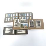 2 albums of topographical postcards, and an album of cigarette cards (3)