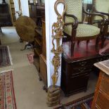 An Indian hardwood carved column with figural and snake decoration, H160cm