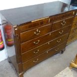 A large 18th century mahogany chest, having 2 banded drawers above 2 short and 3 long drawers,