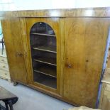 A large Art Deco German walnut 3-door armoire, with fitted adjustable shelves, W212cm, D44cm, H187cm